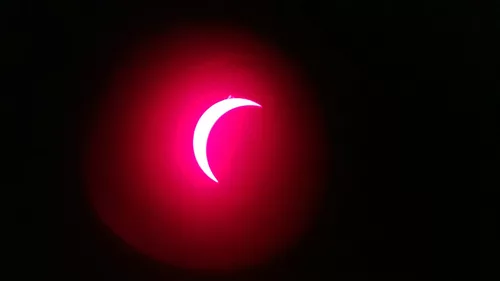 Solar eclipse, ≈ 90%.